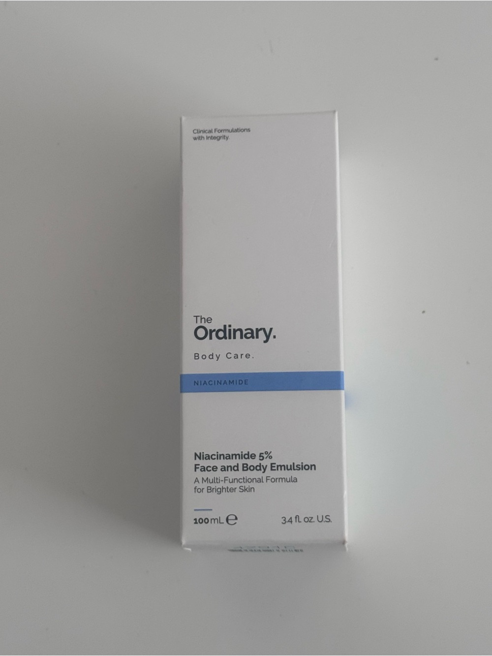 The Ordinary Niacinamide 5% Face and Body Emulsion - White with Blue Accent